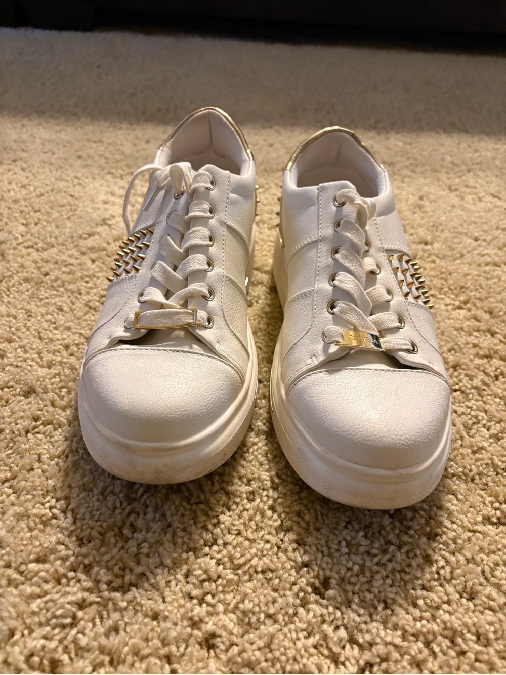 Women's White Low-Top Sneakers with Gold Stud Accents